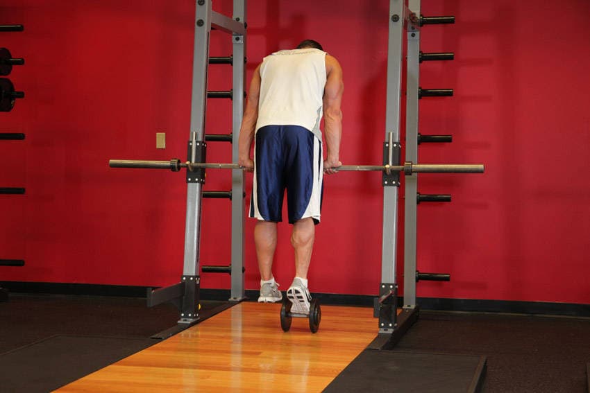 Calf Raise On A Dumbbell step 2