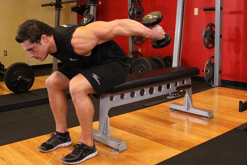 Seated Bent-Over Two-Arm Dumbbell Triceps Extension step 2