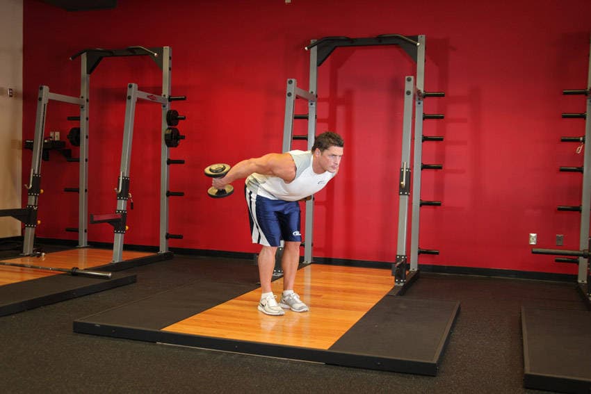 Standing Bent-Over Two-Arm Dumbbell Triceps Extension step 2