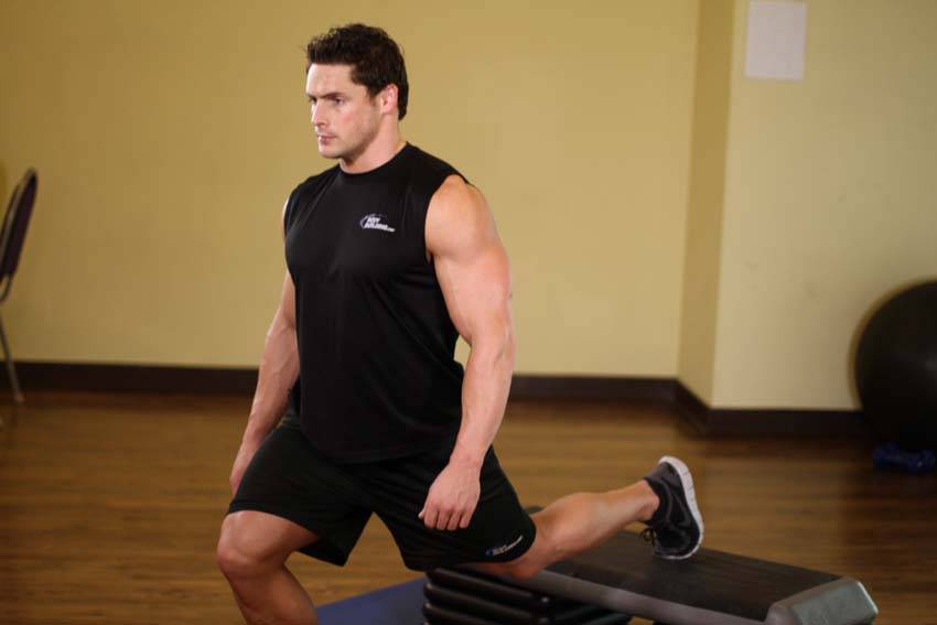 Standing Elevated Quad Stretch step 2